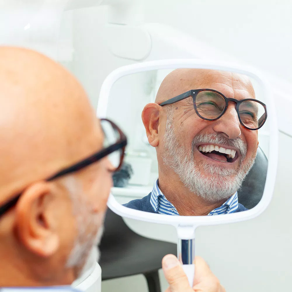 Angela Laithangbam, DDS Inc. | Oral Cancer Screening, Intraoral Camera and Dental Bridges